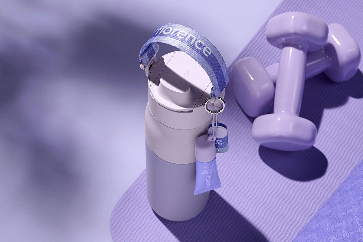 florence by mills x BRITA LARQ bottle on purple background with a sporty background.